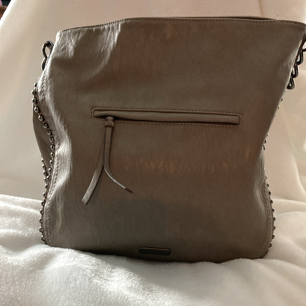 Jessica Simpson Bag with Studs and signature feather.